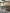 Torjin - 3 Pc. - Long Counter Table, 2 Stools - Dark Brown