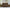 Beckley Place - 2 Seat Power Reclining Sofa With Adjustable Headrest - Earth