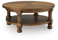 Chadworth - Round Cocktail Table - Medium Brown