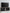 Wildenauer - XL TV Stand With Fireplace Option - Brown / Black